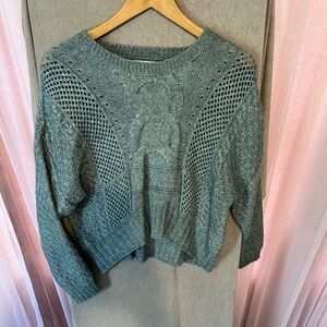 Green knit sweater, size S.